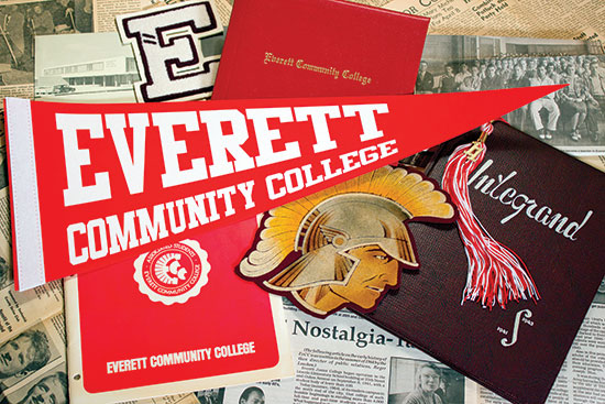 EvCC yearbook, Trojan logo, and other historical items.