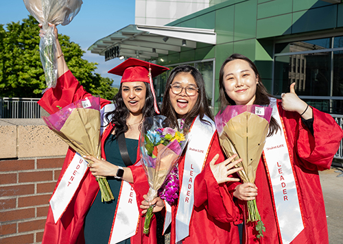 Danya Allsh, EvCC graduate on the left.