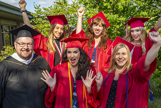 Clipper editors celebrate at EvCC's 2019 graduation. 