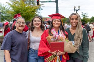 AAliyah Garcia with Nicole Nsa and two other students