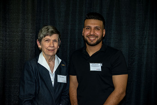 Anne Loring, widow of U.S. Marine Corps Lt. Col. Arthur P. Loring Jr., with EvCC student Carlos Figueroa, who earned the scholarship named for Lt. Col. Loring and the Gary Parks Memorial Scholarship. 