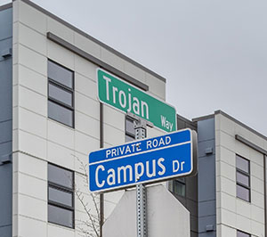Trojan Way and Campus Drive street signs. 
