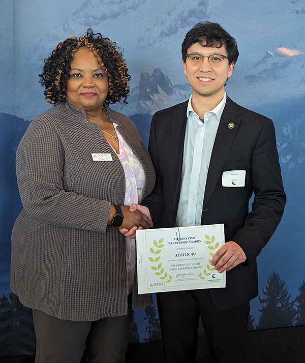 EvCC president Chemene Crawford congratulates student Austin Au at the Civic Leadership Awards April 19 at the Museum of Flight in Seattle.