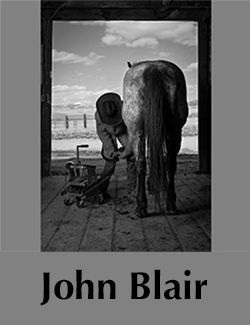 grey field with black and white photo of a person in western regalia next to a horse. text reads john blair