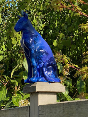 Ann Morgan- ceramic statue of a cat with a cobalt blue glaze.