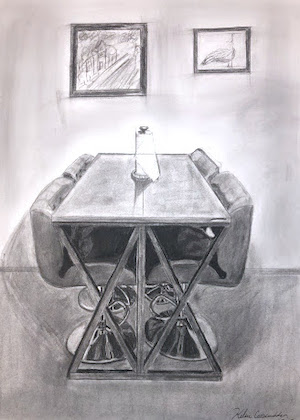 Kelsie Carscadden- charcoal drawing of a table.